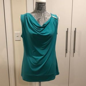 Green sleeveless blouse